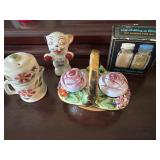 Vintage roses in a basket, salt and pepper