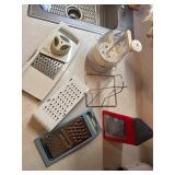 Pampered chef mandolin, slicer, chicken cooker etc