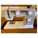 Janome New home, sewing machine, and sewing desk