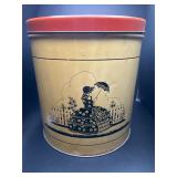 Vintage tin full of hair rollers