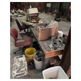 Wooden table, chair, water meter, hard hats etc