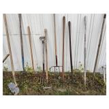 Antique pitchforks, stirrup shovel, hoe etc