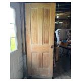 Two vintage four panel doors.