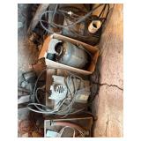 Metal reel, pumps, two pairs of sawhorses