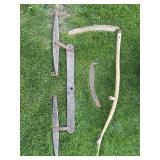 Antique swingle tree, scythe, and blade