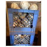 2 milk crates of softballs