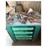 Vintage metal shelf with hand tools pipe