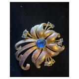 Vintage floral brooch with blue stones