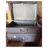 Two vintage monarch hard side suitcases