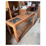 Wooden table with glass inserts
