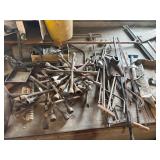Vintage tire irons, tire, jacks, brackets, etc.