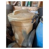 Plastic garbage cans, blue barrel, sawhorses