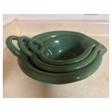 Set of three mixing bowls with sprouts