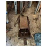 Floor jack, metal pipes, fence stake, rebar etc