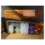 Pistol primers, primed 9mm casings, containers