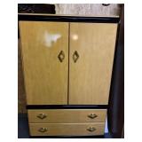 Wood cabinet with black accents