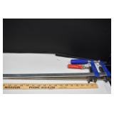 Two Long Metal Clamps