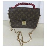 Marked Louis Vuitton Pochette Metis Braided Bag