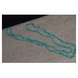 Long Strand of Turquoise Like Beads