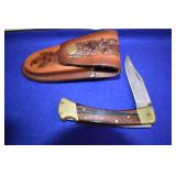 Buck 110 Folding Knife W/ Tooled Case,Tip Of Knife