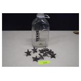 Glass Milk Bottle & Cast Iron Stars