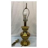 Heavy brass lamp. Works.