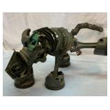 Steam punk dog peeing yard statue