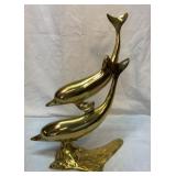 Brass dolphins