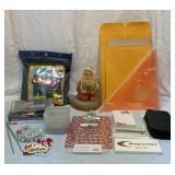 Rain suit, marbles, DVDs, office supplies, etc.