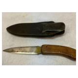 Fixed blade knife with sheath. 4 inch blade.