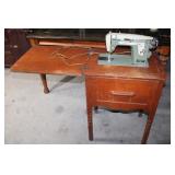 Vintage New Home Sewing Machine in Cabinet 31 x