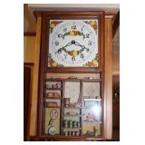 Vintage Wall Clock with Figurines on Shelves
