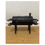 Handmade, small-scale metal smoker with ring-shape