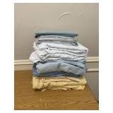 6 pcs of sheets (unknown sizes) and 9 pillow cases
