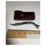 Compact Curved Damascus-Pattern Knife ï¿½ Blue/Whith