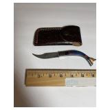 Curved Damascus-Pattern Folding Knife ï¿½ Blue/Red h