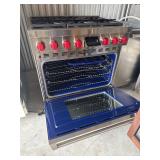 Wolf Stainless Steel Gas Range with Red Knobs