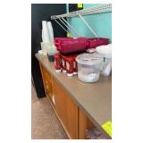 Lot of all contents on countertop and in cabinets