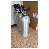 Three carbon dioxide cylinders