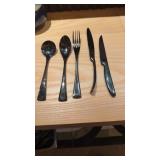 Large lot of black stainless steel flatware