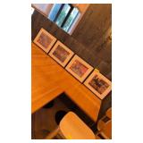 Four framed oriental themed photos