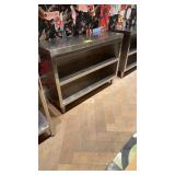 47 inches wide by 16 inches deep stainless steel