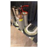 Two carbon dioxide tanks with one regulator