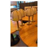 Four lamps with shades