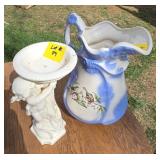 White and Blue Pitcher with Angel Figurine Holding