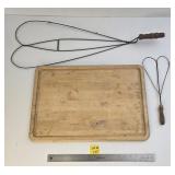 Two Rug Beaters and a Cutboard