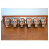 COPPER DOLL HEAD MOLDS ON STEEL MOUNTED ON WOOD
