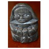 Inuit Sculpture of a Woman with Animal Abraham Pov