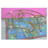CAST ALUMINUM TABLE SURROUNDING CIRCULAR SEATING