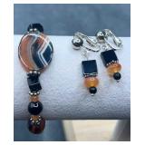 Black/orange beaded bracelet & clip on earring